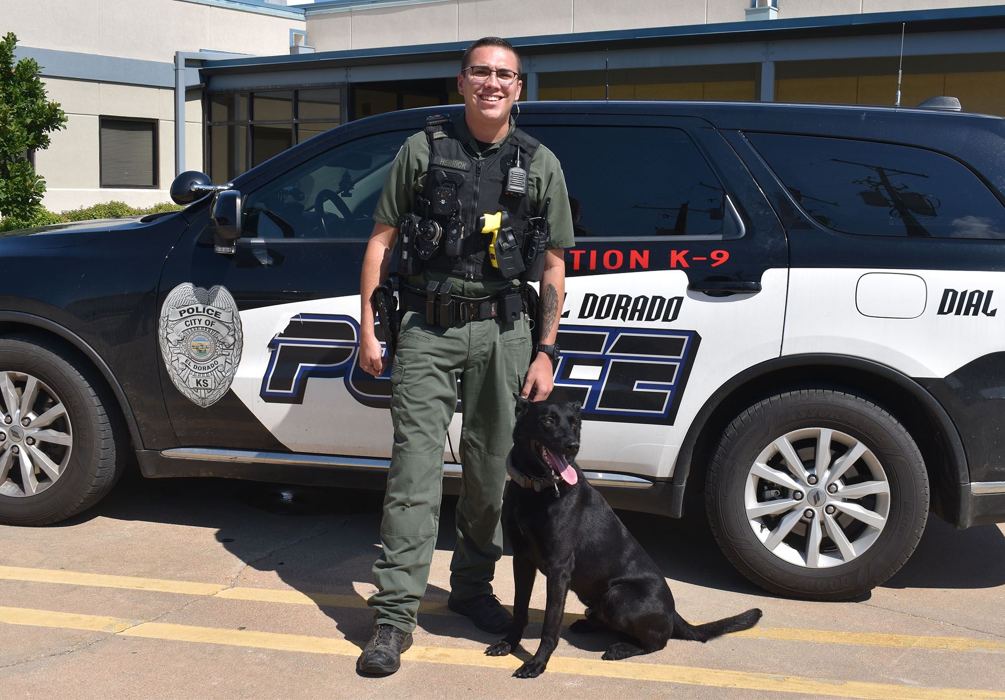 Officer Ethan Herrick and Rico